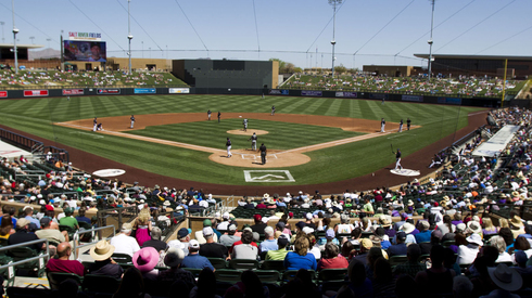 Fans watch as the Seattle Mariners and Colorado Rockies play in the 2013 Cactus League. (Photo Nick Ozo Arizona Republic and azcentral.com)